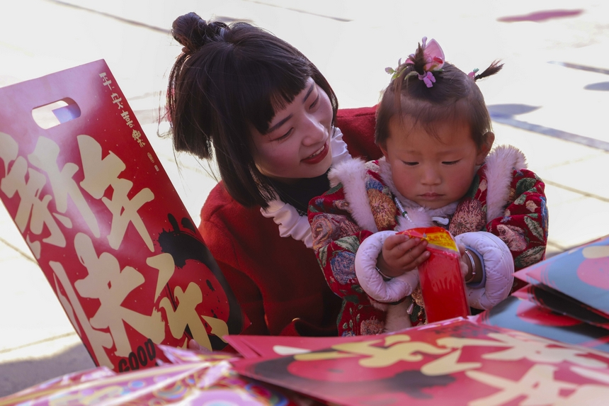 現(xiàn)場(chǎng)一片喜氣洋洋的景象。管慶巍攝