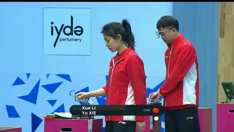 李雪（左）、謝瑜比賽現場。